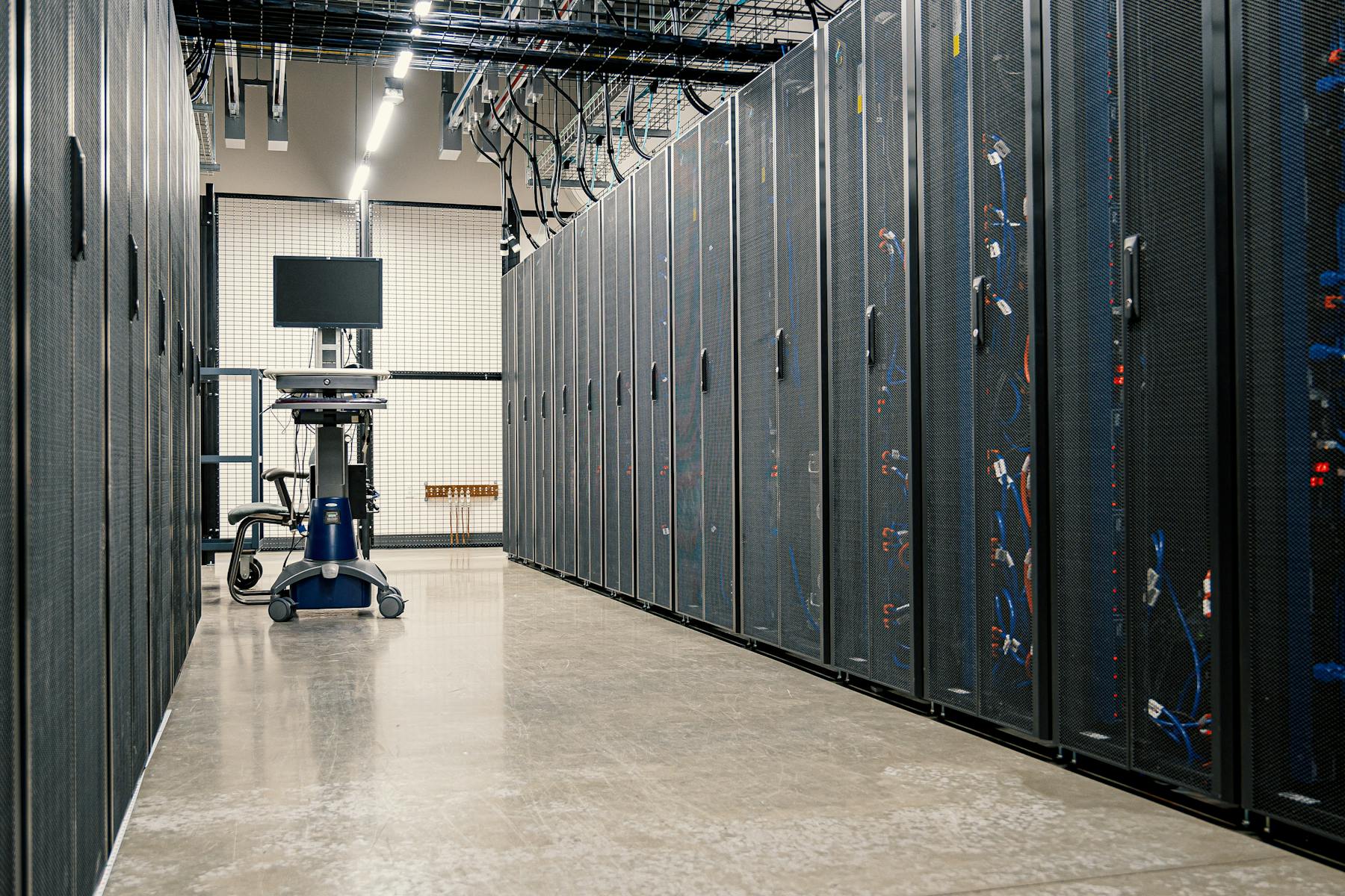 Modern enterprise data center corridor with server racks