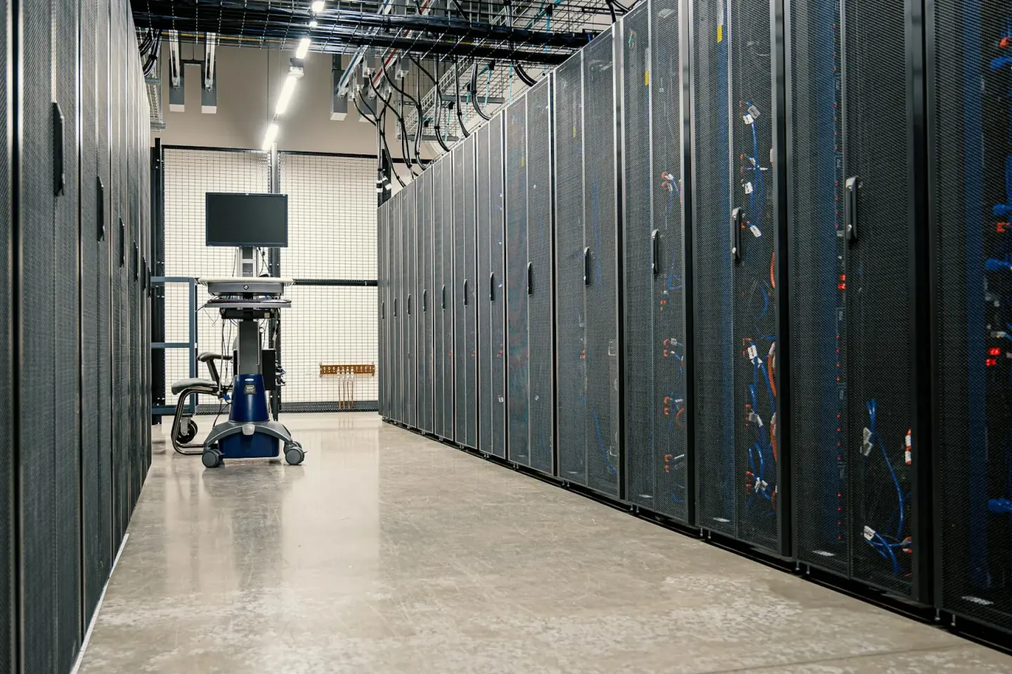 Modern enterprise data center corridor with high-density server racks